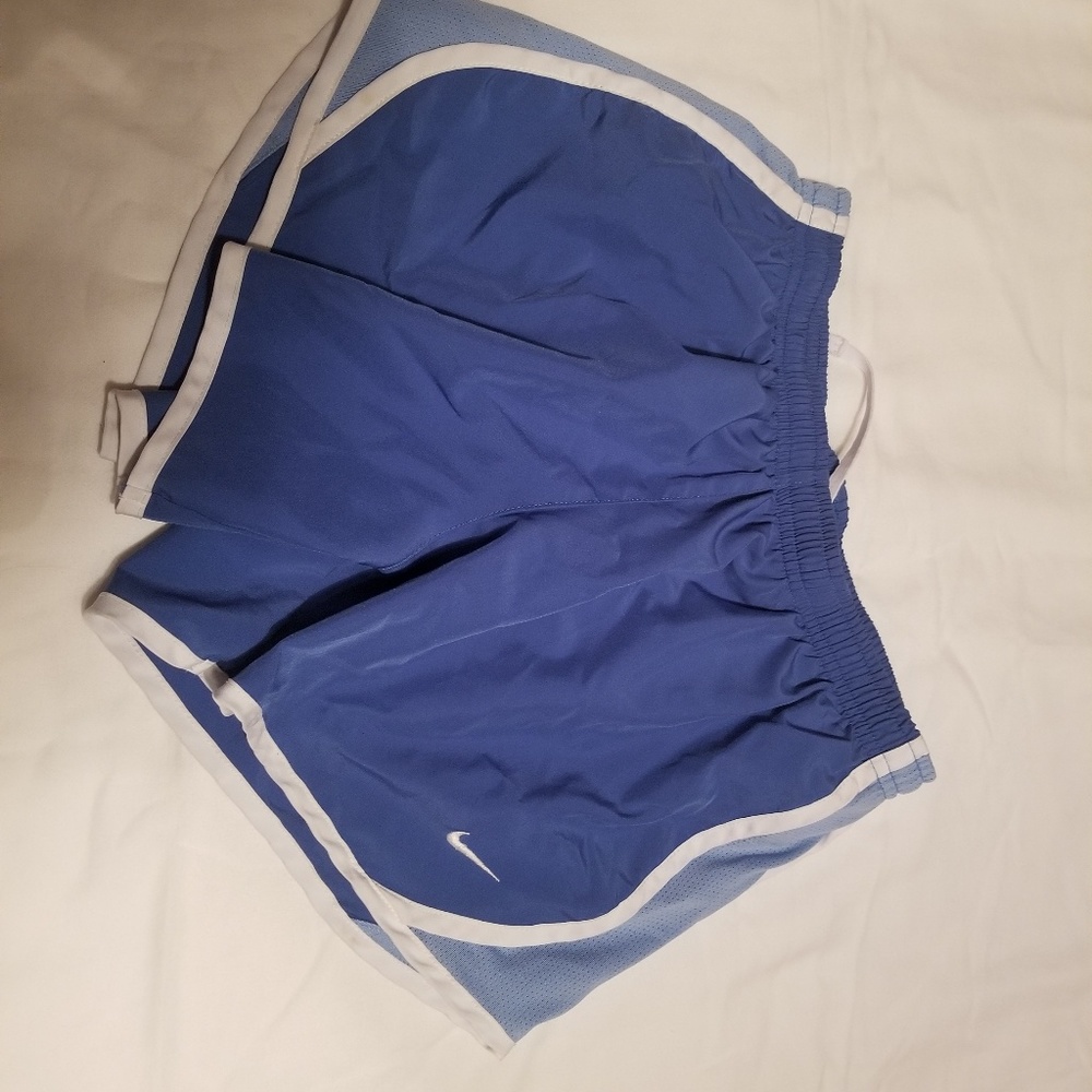 Blue Nike running shorts, girls size large